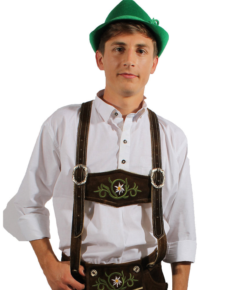 A man wearing a traditional white Oktoberfest shirt with a collar and a shirt pocket, complemented by a green hat and brown lederhosen, against a plain background.