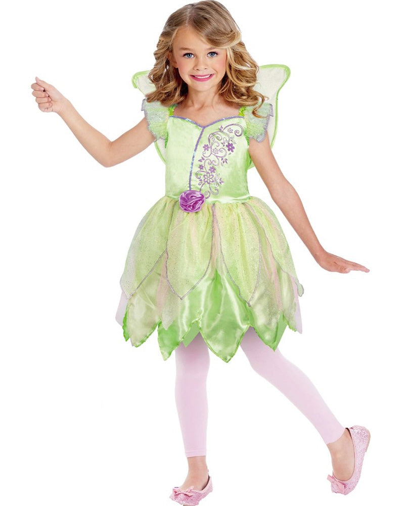 A young girl wearing a green and purple Garden Fairy costume with silver-framed light-green mesh wings, a satin bodice with flower details, and a multi-layered skirt.