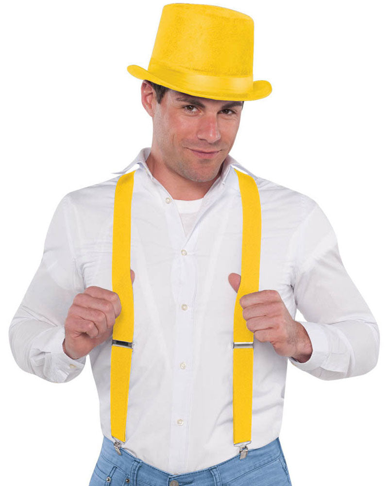 Image of man wearing white shirt, yellow top hat and suspenders.