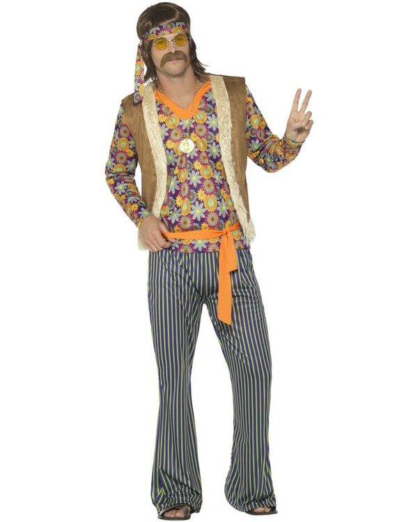 Image of man wearing 60s hippie pants, top and vest with matching headband. 