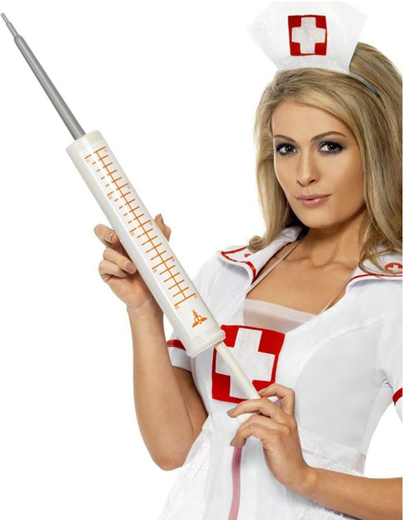 Image of woman dressed in nurse costume holding jumbo sized syringe. 