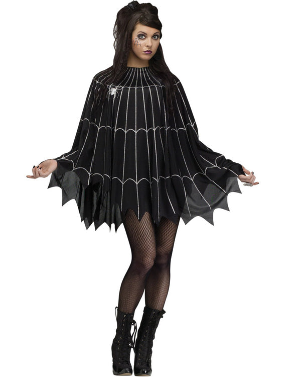 Image of woman wearing black cape with scalloped edges and spiderweb print.