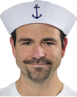 Image of man wearing white sailor hat with blue anchor.