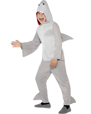 Image of boy wearing grey shark costume jumpsuit. 