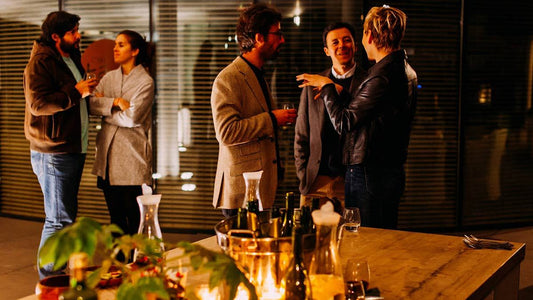 Image of people mingling in an office space. 