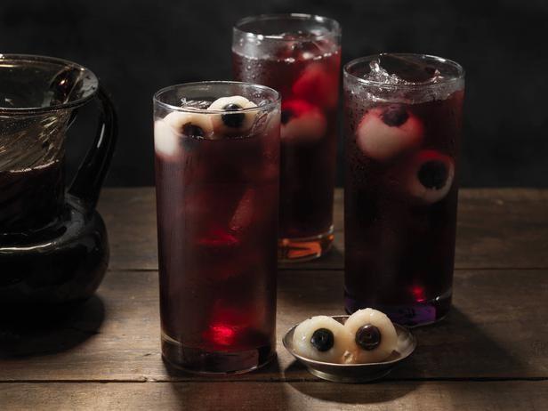 Image of glasses of Halloween eyeball fruit punch drink.