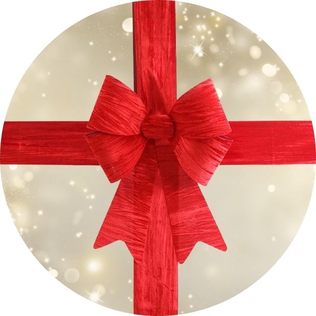 A champagne gold circle with a red Christmas Bow in the middle. Click to shop all Christmas Decorations.