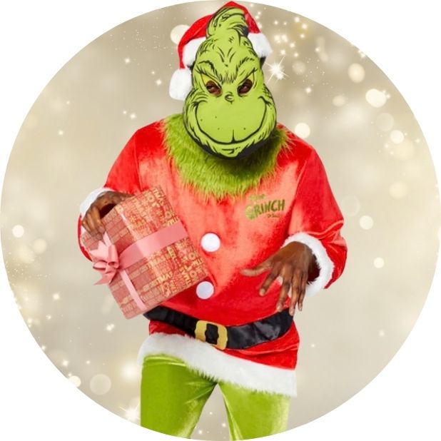 A champagne gold circle with a man wearing a Grinch Costume. Click to shop all mens Christmas Costumes. 