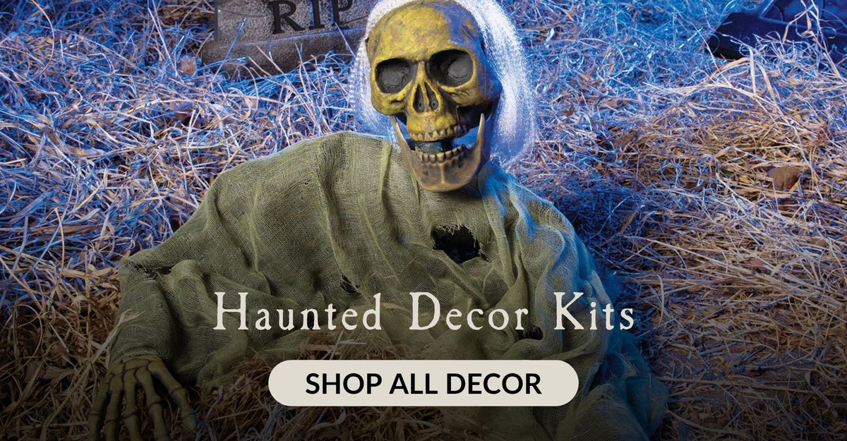 A zombie skeleton Halloween prop in a garden with the heading Haunted Decor Kits. Click to shop all Decor.