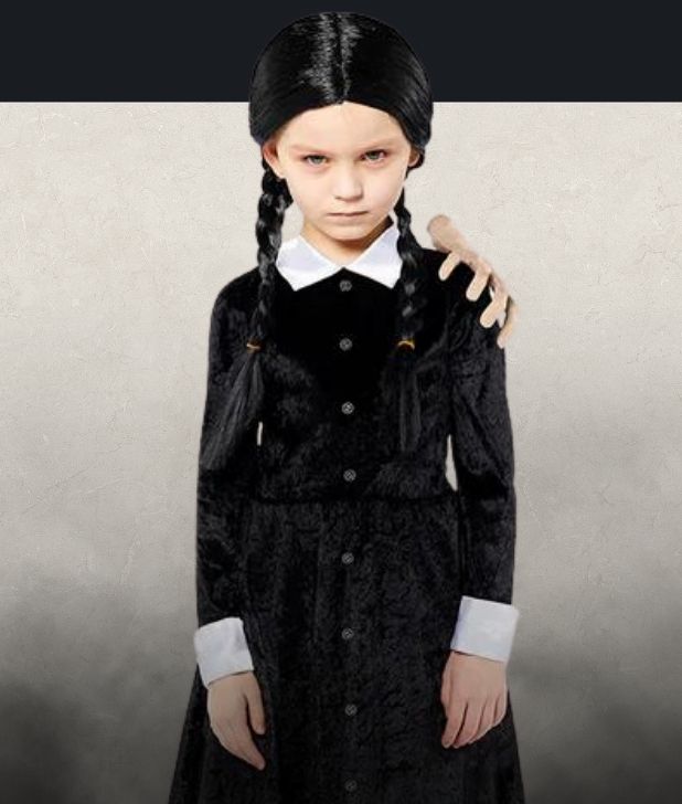 A girl wearing a Wednesday Addams Halloween costume on a beige background. Click to shop all Addams Family Halloween Costumes. 
