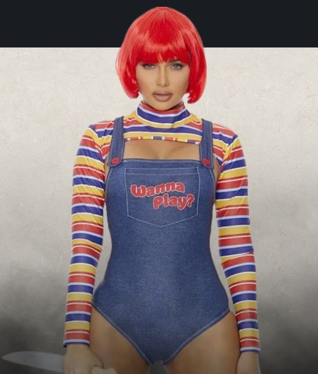 A beige background with black fog at the bottom. Features a womens Chucky character. Click to shop all Broken Dolls Costumes and accessories.