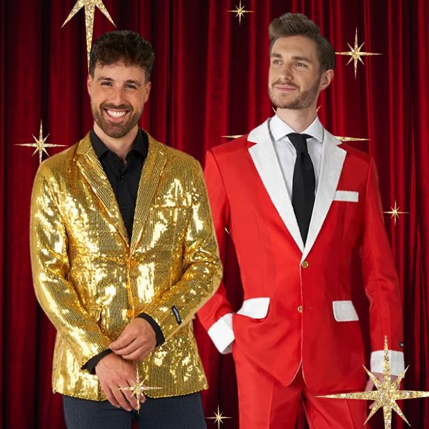 A red curtain background with gold stars and a man wearing a gold sparkly jacket and one wearing a tailored Santa Suit. Click to shop all OppoSuits and Suitmeisters. 
