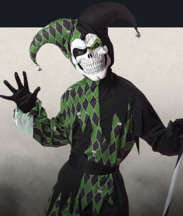 A beige background with black fog at the bottom. Features a boys clown character. Click to shop all Clown Costumes and accessories.