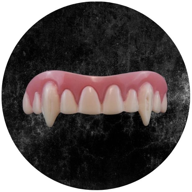 A black circle with vampire teeth. Click to shop all Halloween fangs and teeth.