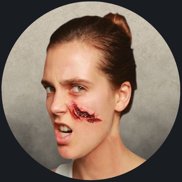 A beige circle and a lady with an SFX cut on her face. Click to shop all Halloween Makeup and SFX.