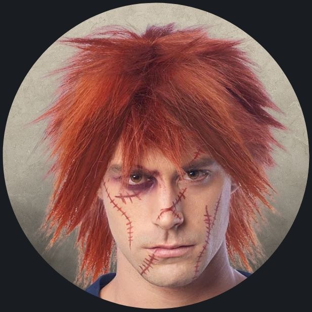 A beige circle with a man wearing a Chucky Wig. Click to shop all Halloween Wigs.