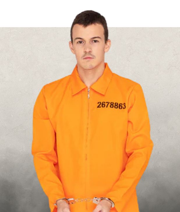 A man wearing an orange prisoner jumpsuit on a beige background. Click to shop all Asylum Halloween Costumes. 