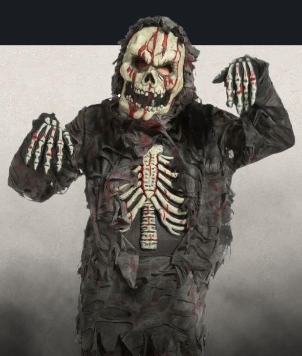 A beige background with black fog at the bottom. Features a Boys Apocalypse Hazmat Suit character. Click to shop all Zombie Apocalypse Costumes and accessories.