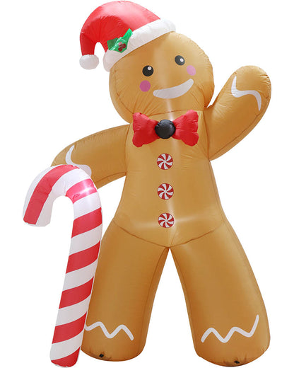 Inflatable gingerbread man Christmas decoration with a red Santa hat, red bow tie, candy accents, and a large red-and-white striped candy cane, shown on a plain white background.