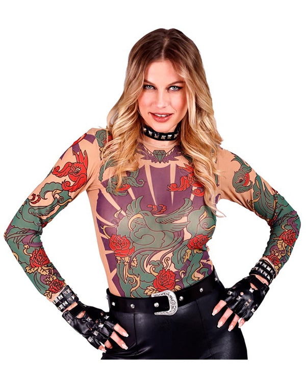 Woman wearing a long-sleeve top with intricate tattoos and black leather gloves on a white background