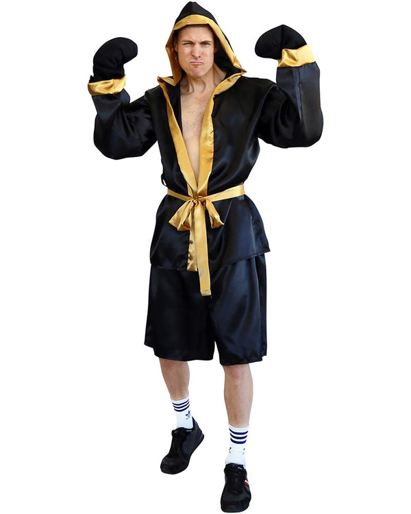 Person wearing a black and gold boxing outfit with a white background