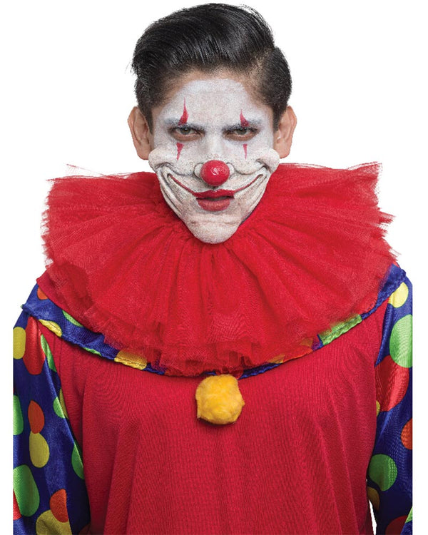 Person wearing a clown costume with a red nose and colorful outfit on a white background