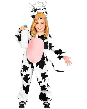 Child wearing a cow costume with a pink udder on a white background
