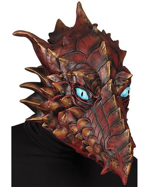 Dragon mask with detailed scales and blue eyes on a black background