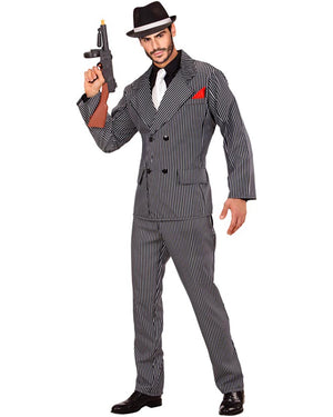 Man in a vintage suit with a hat and gun on a white background