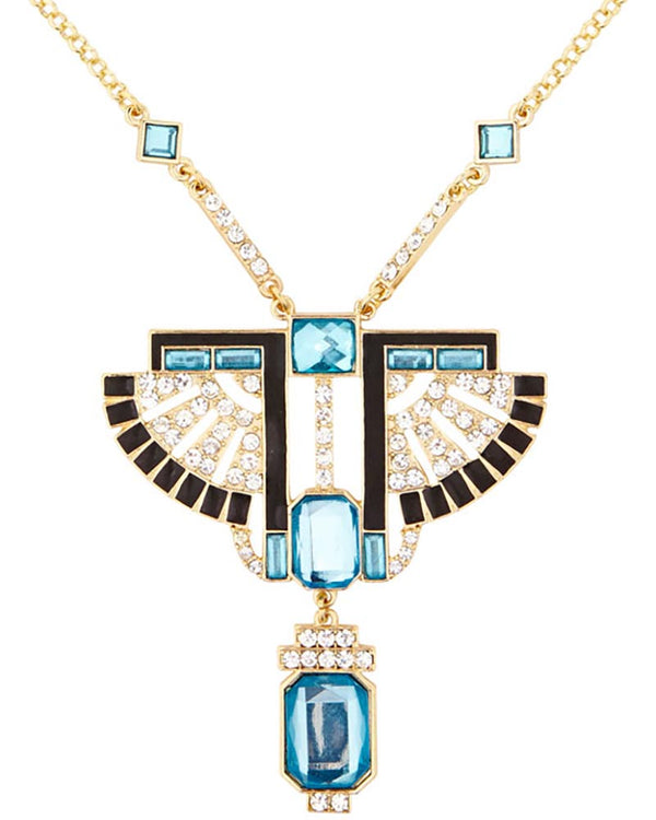 Elegant necklace with blue gemstones and gold accents on a white background
