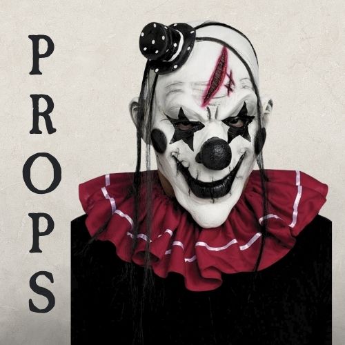 A Halloween Clown mask on a beige background with the headline PROPS. Click to shop all Halloween Props and Accessories.