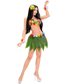 Woman in a hula costume with a green leaf skirt and colourful accessories on a white background