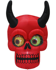 Red inflatable devil skull Halloween decoration with black horns, black nose and mouth details, and large green glittery eyes on a white background.