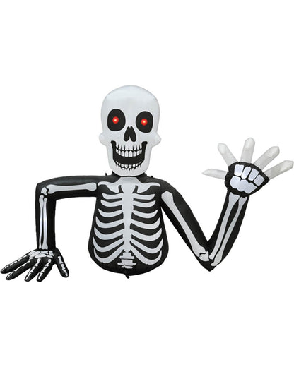 Inflatable skeleton Halloween decoration with a white skull head, black and white rib cage, and raised hand, shown on a plain white background.