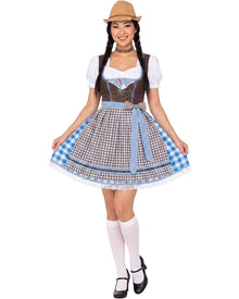 A woman modeling a traditional German dirndl costume against a plain white background. The costume includes a brown faux-leather bodice with white trim, a white short-sleeve blouse, a brown and white gingham skirt with a blue gingham apron overlay, white knee-high socks, black Mary Jane shoes, and a tan hat.