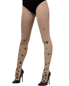Beige tights with black spider design worn by a person on a white background