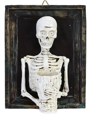 Skeletal figure in a dark wooden frame