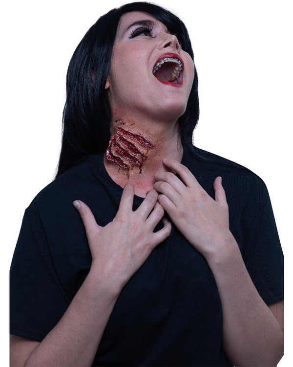 Person with a bloody neck wound on a white background