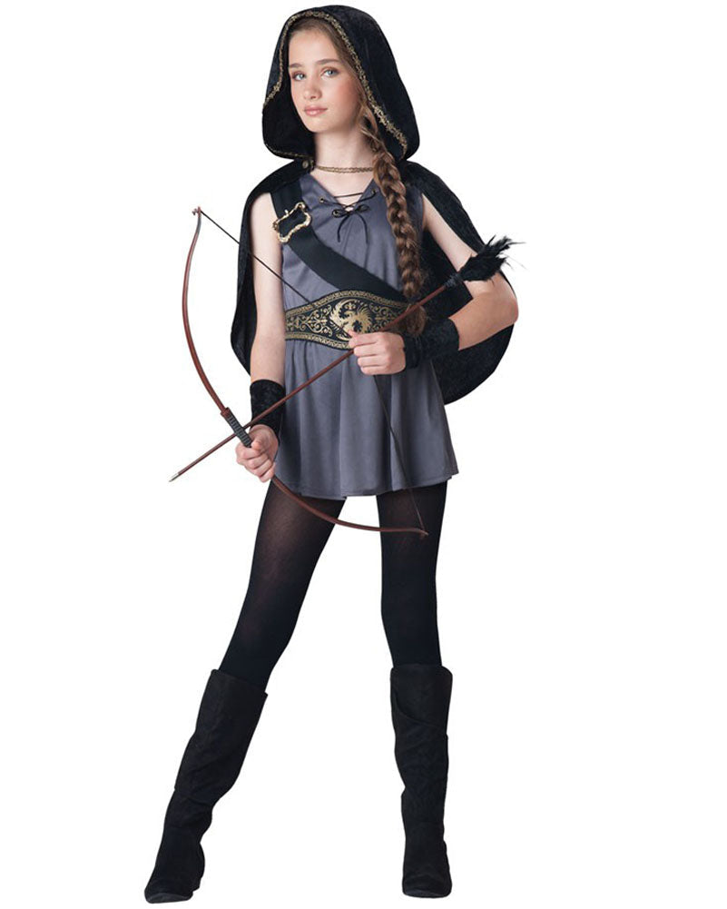 Tween girl in a Hooded Huntress costume with a hood, tunic, gauntlets, and printed belt, holding a bow and arrow.