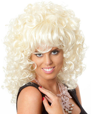 Image of woman wearing blonde curly Dolly Parton style wig.