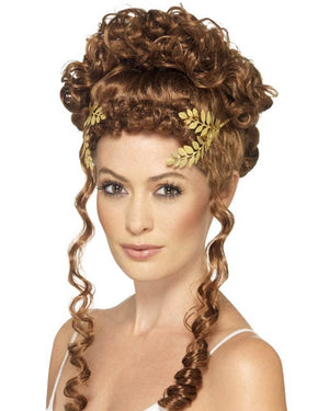 Image of woman wearing gold laurel leaf headpiece. 