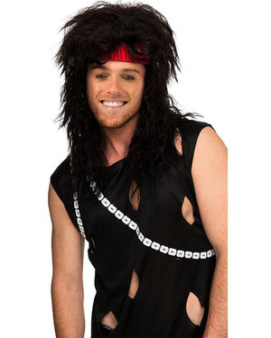 Image of man wearing black 80s style wig with red bandana and black singlet. 