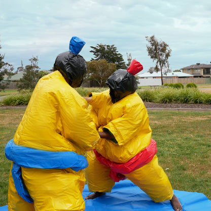 Two PVC and Fabric Adult Sumo Suits with Helmets Gloves and 291cm Mat
