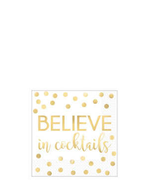 Image of white napkin with gold dots and writing that says 'believe in cocktails'.