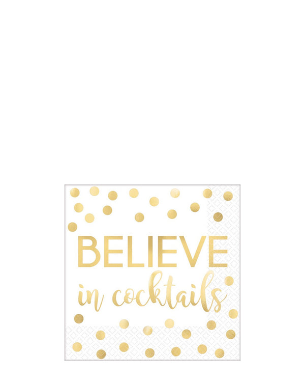 Image of white napkin with gold dots and writing that says 'believe in cocktails'.