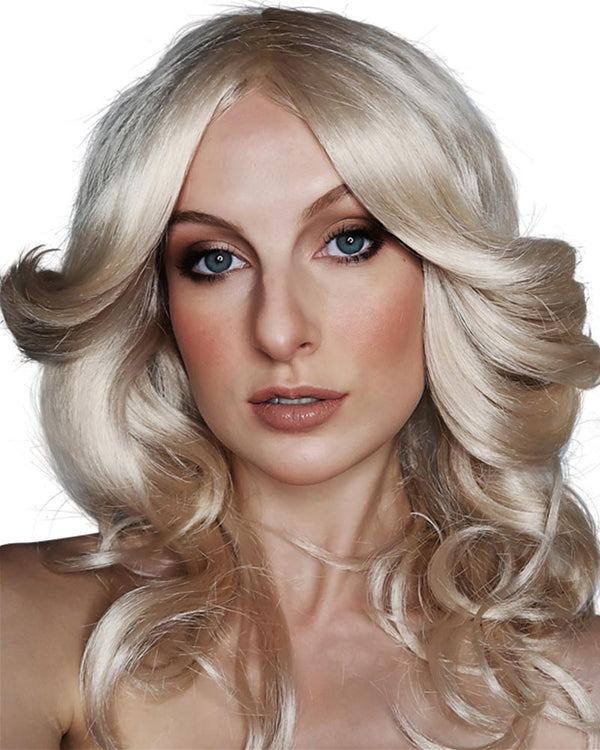 Image of woman wearing blonde 70s Farrah Fawcett style wig.