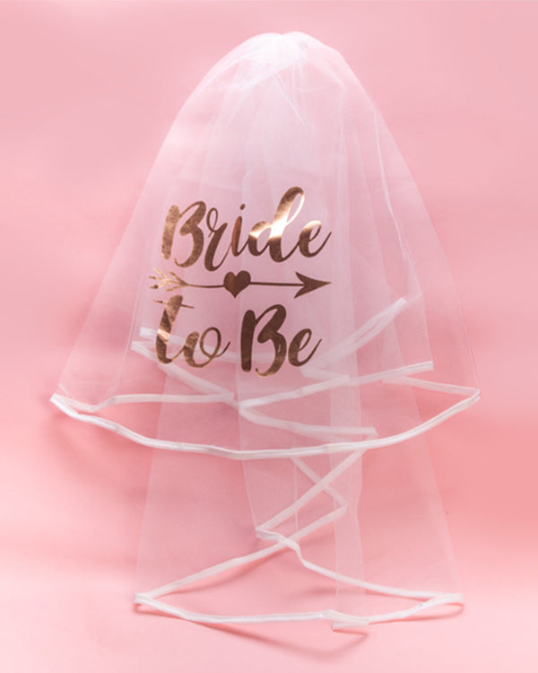 Image of white mesh veil with 'bride to be' written in rose gold.