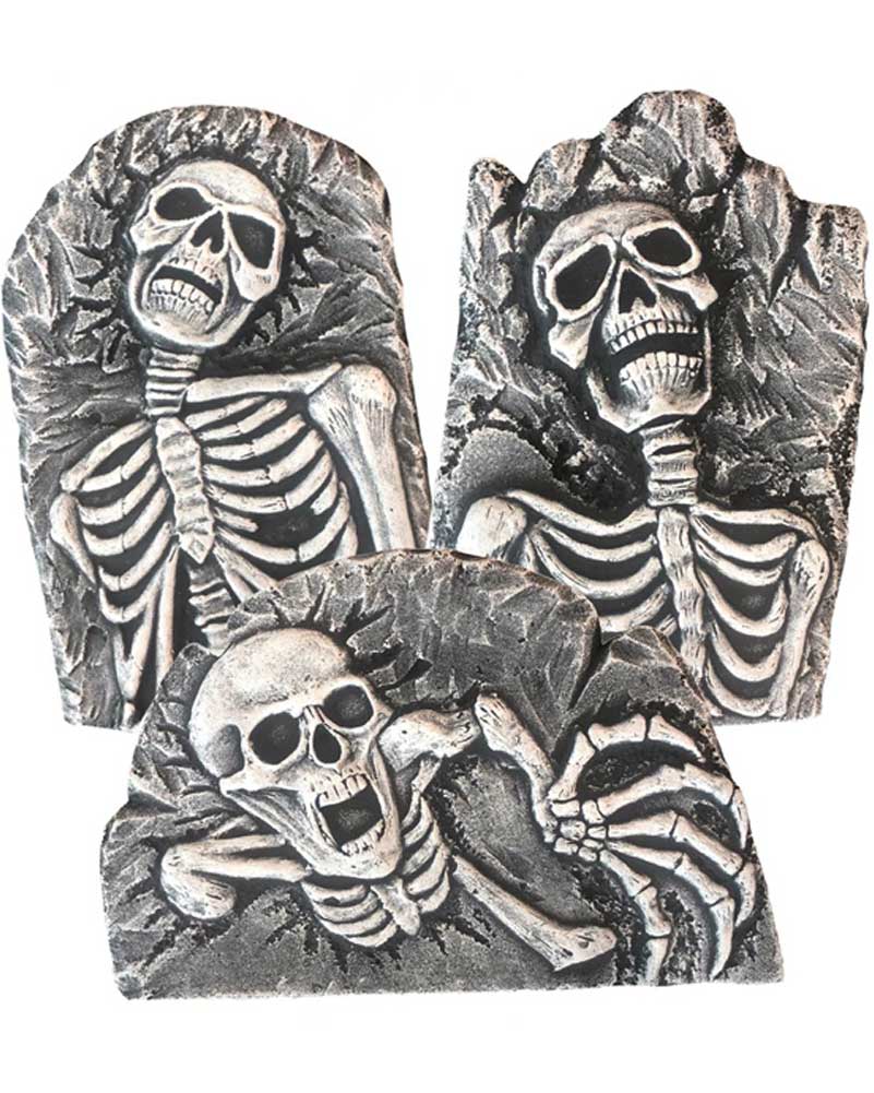 Image of three grey tombstones with skeletons. 