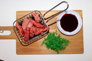 Finger Chips with Blood Sauce and Moss Salad Prop