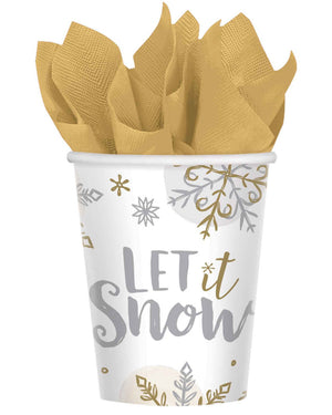 Image of white, gold and silver paper cup with gold napkin inside and 'let it snow' written on the front.